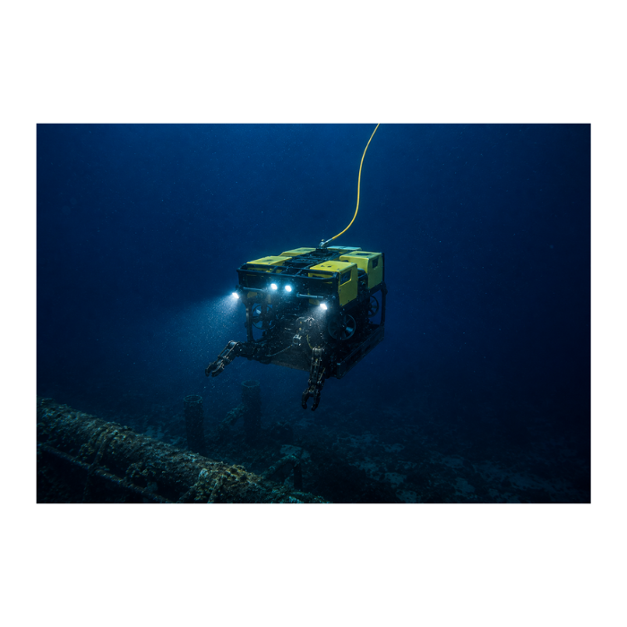 Underwater ROV robot performing an inspection on subsea infrastructure